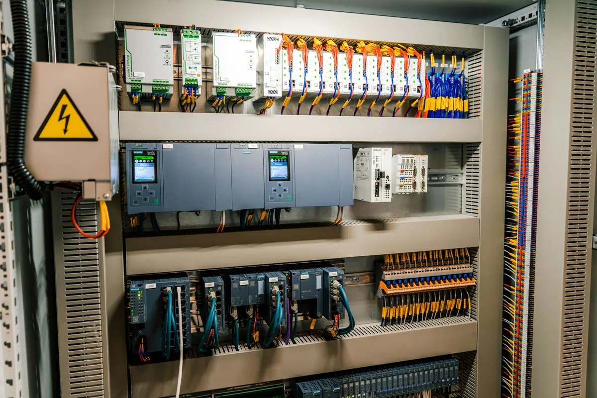 Electrical control cabinet with wiring and control components