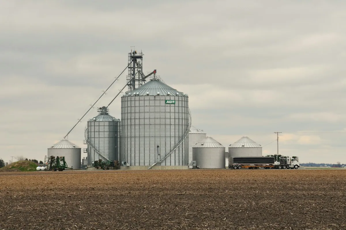 Grain storage silos with bucket elevators and conveying equipment