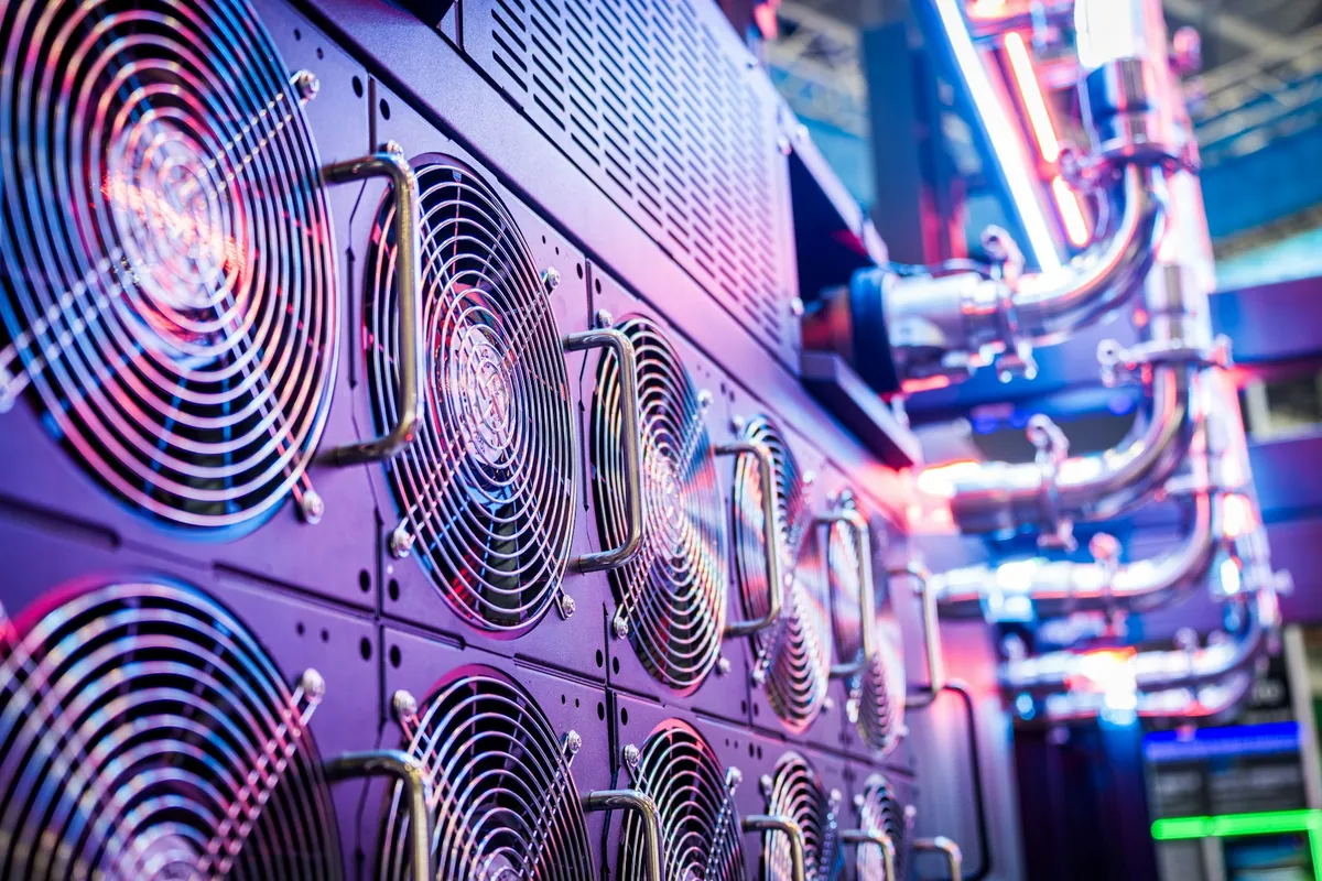 Close-up of cooling fans and pipe connections in server equipment