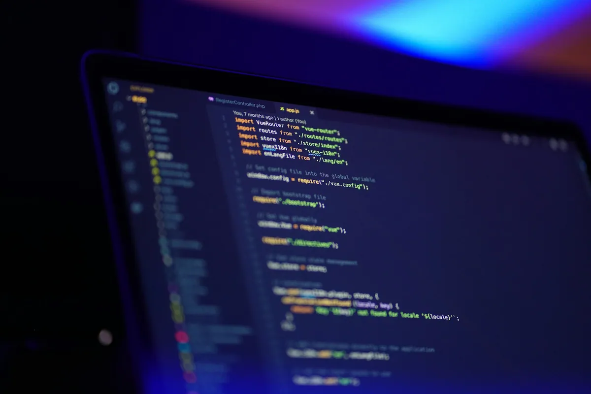 Source code displayed on a laptop screen