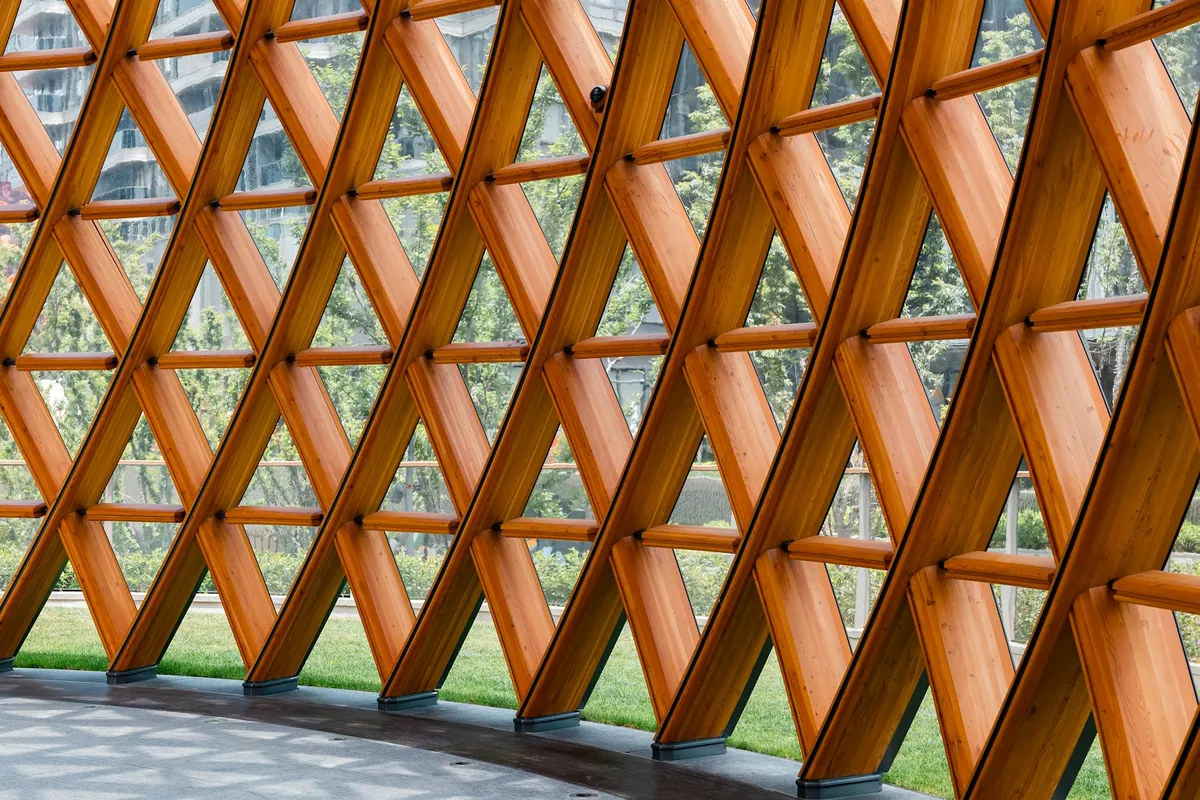 Curved timber lattice with a repeating structural pattern